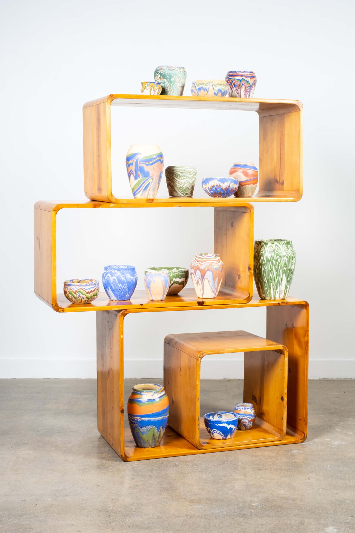 Vintage Pine 4-Piece Modular Stacking Shelving, shown with assorted stoneware