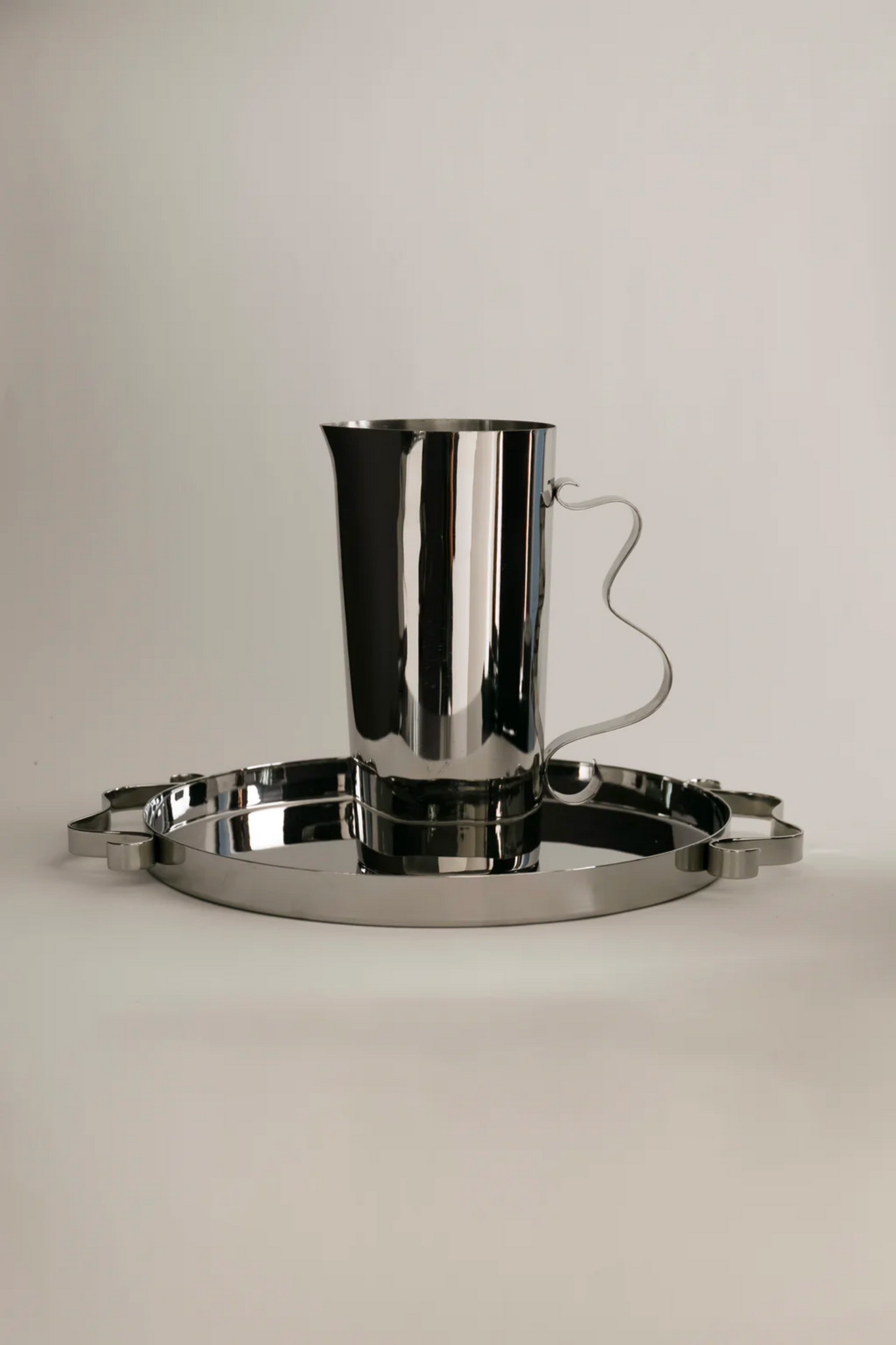 Stainless Steel Squiggle Tray Sophie Lou Jacobsen, shown with squiggle pitcher