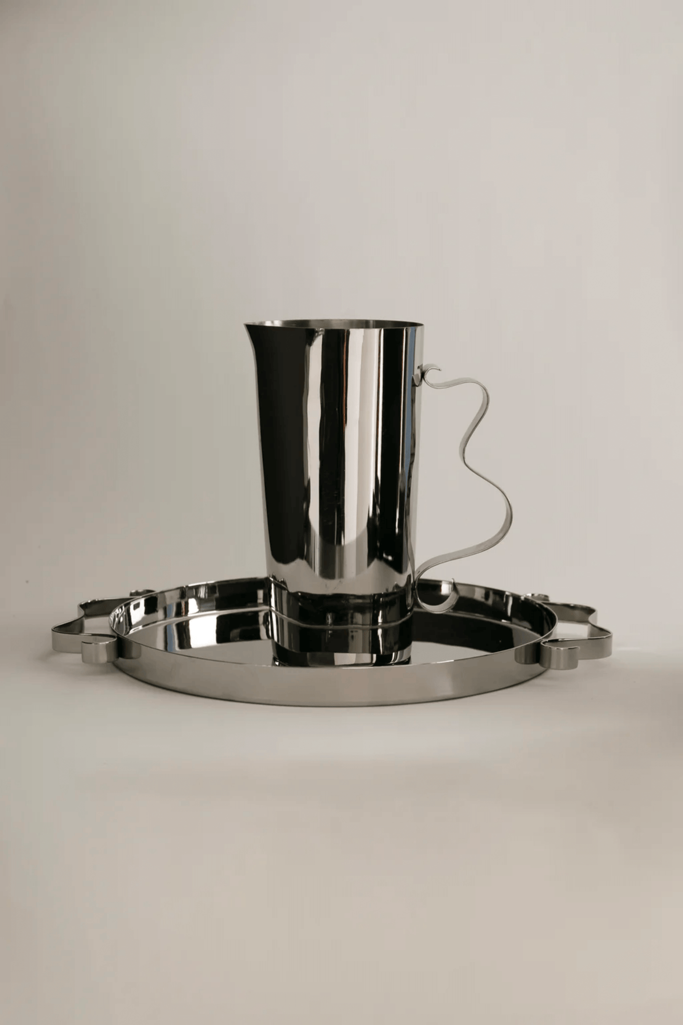 Stainless Steel Squiggle Pitcher Sophie Lou Jacobsen, show with squiggle tray