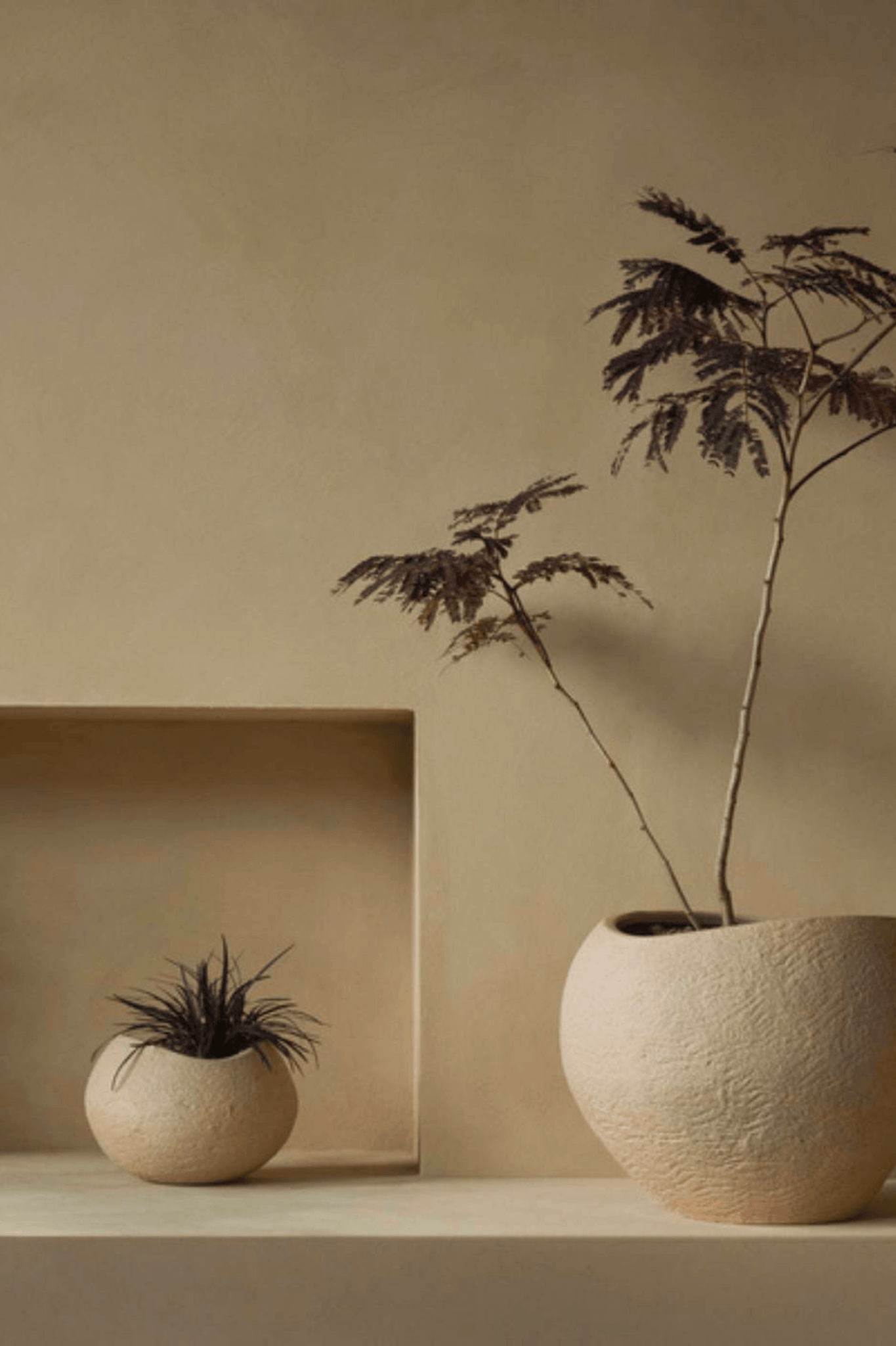 Small Ivory Plantas Planter by Menu shown with a large planter