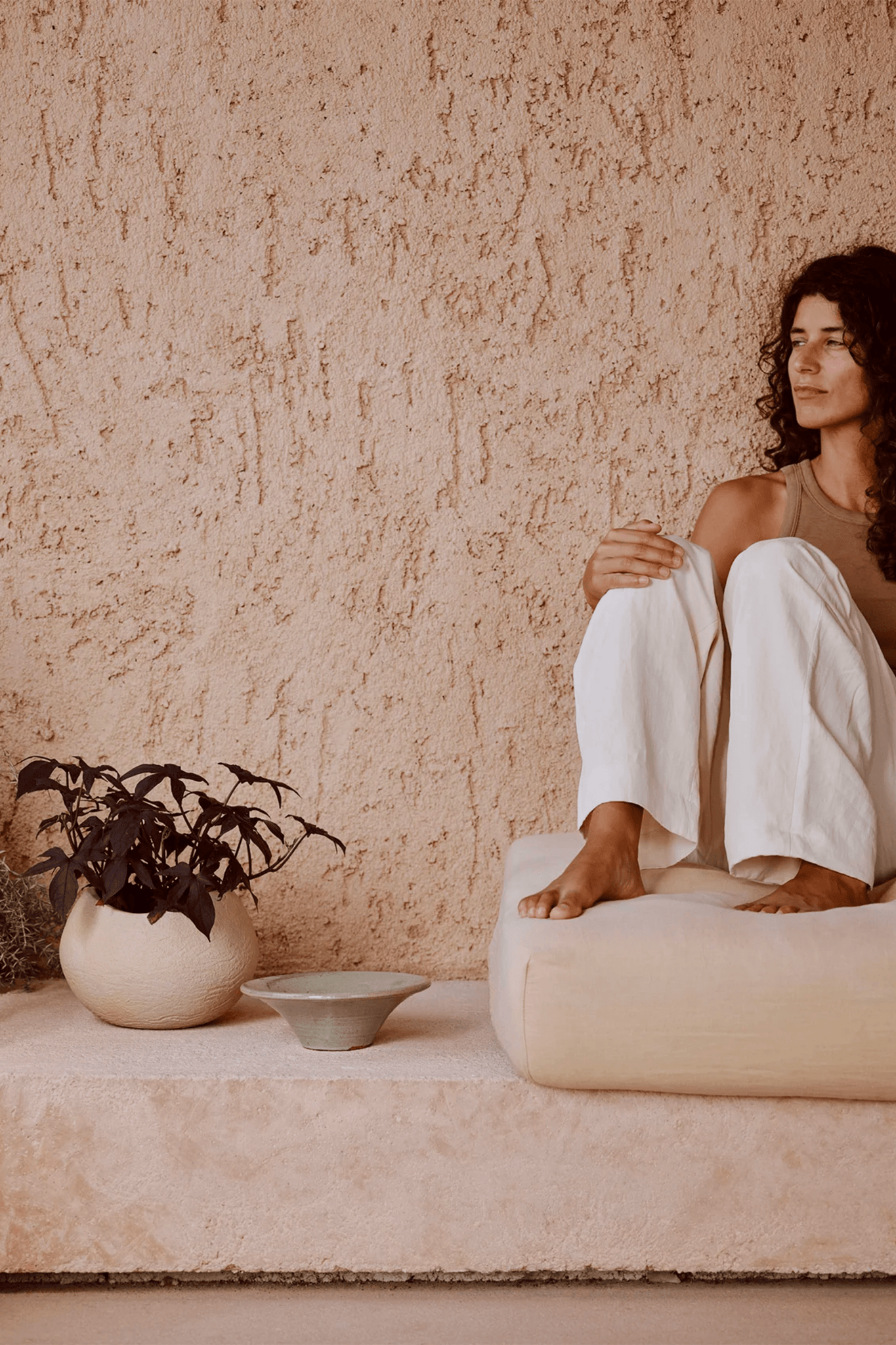 Large Ivory Plantas Planter by Menu, shown beside a woman