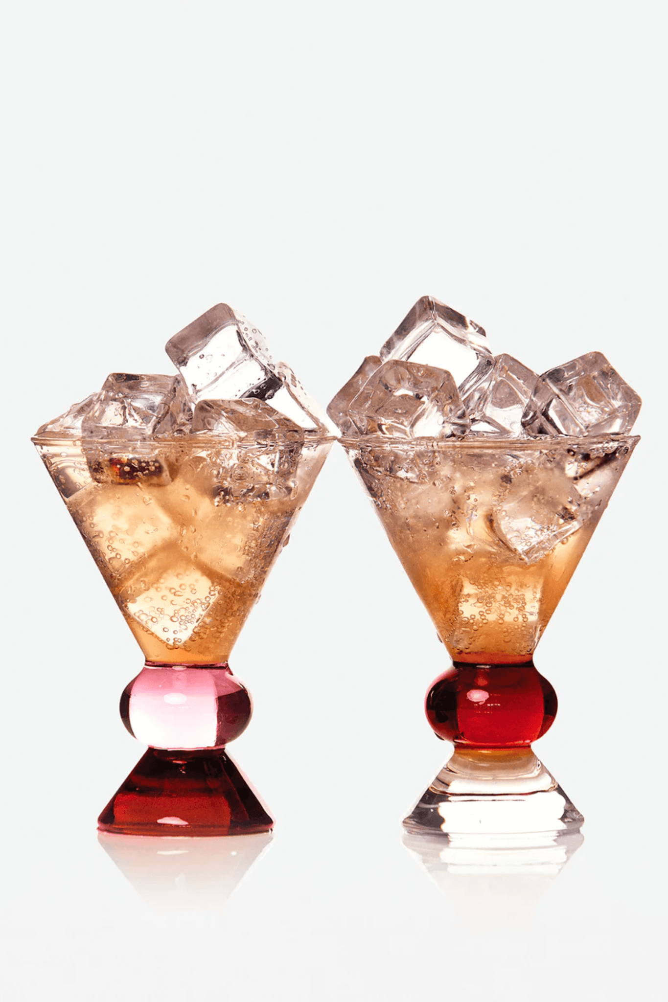 Pink, Amber & Clear Provence Totem Glasses Sophie Lou Jacobsen, shown full of ice with a drink