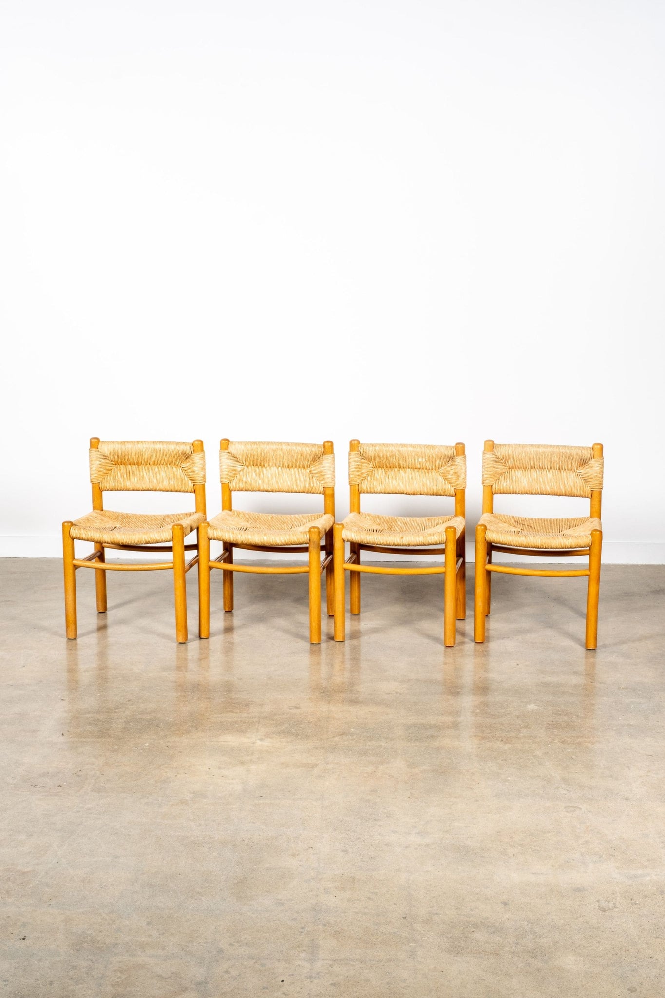 Set of 4 Dordogne Dining Chairs by Charlotte Perriand | Bonne Choice