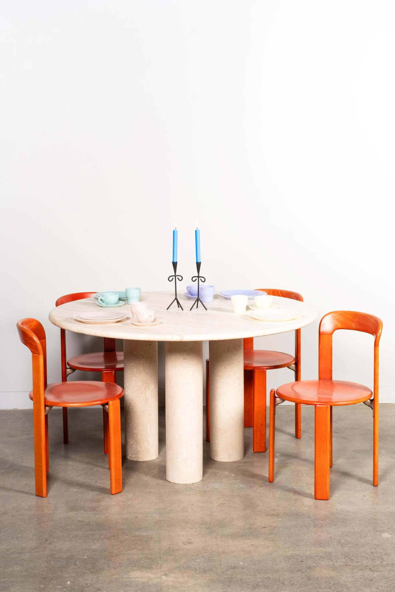 Vintage Italian Natural Travertine 3-Pedestal Table, shown with chairs and a set table top