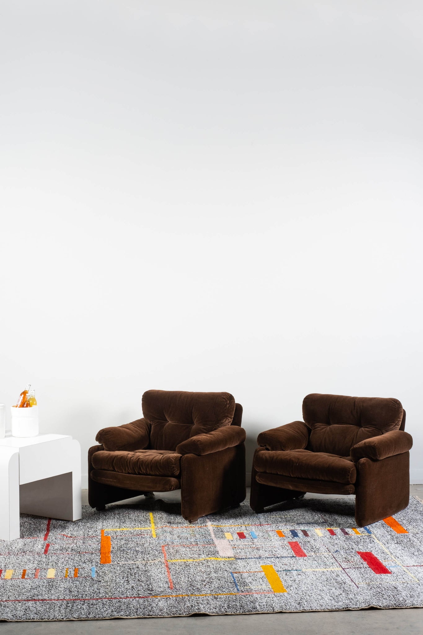 Pair Vintage Coronado Armchairs in Orginal Brown Velvet C&B Italia Afra Tobia Scarpa, shown side by side on a rug with a side table
