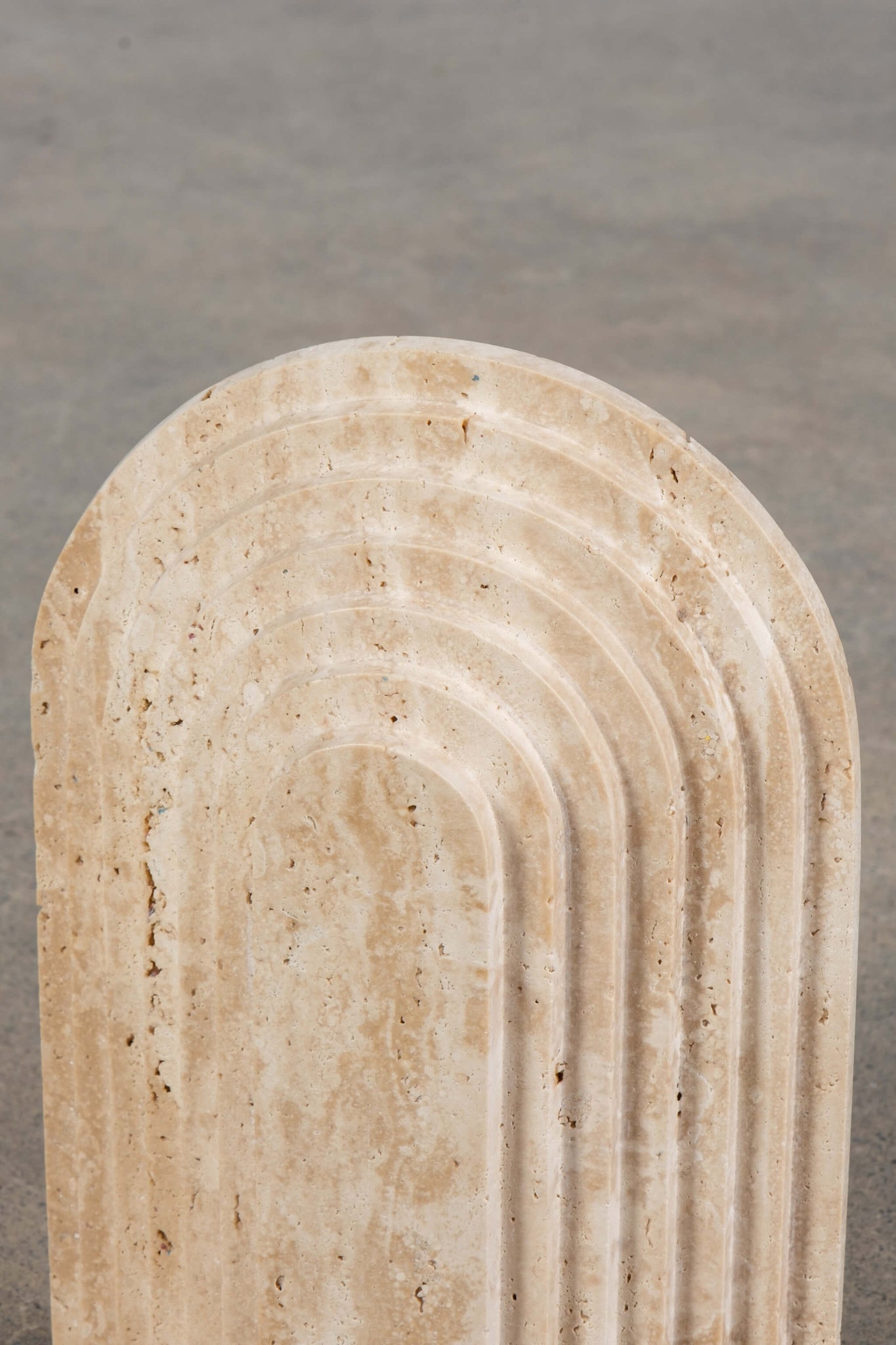 Pair of Arched Bookends in Travertine, close up