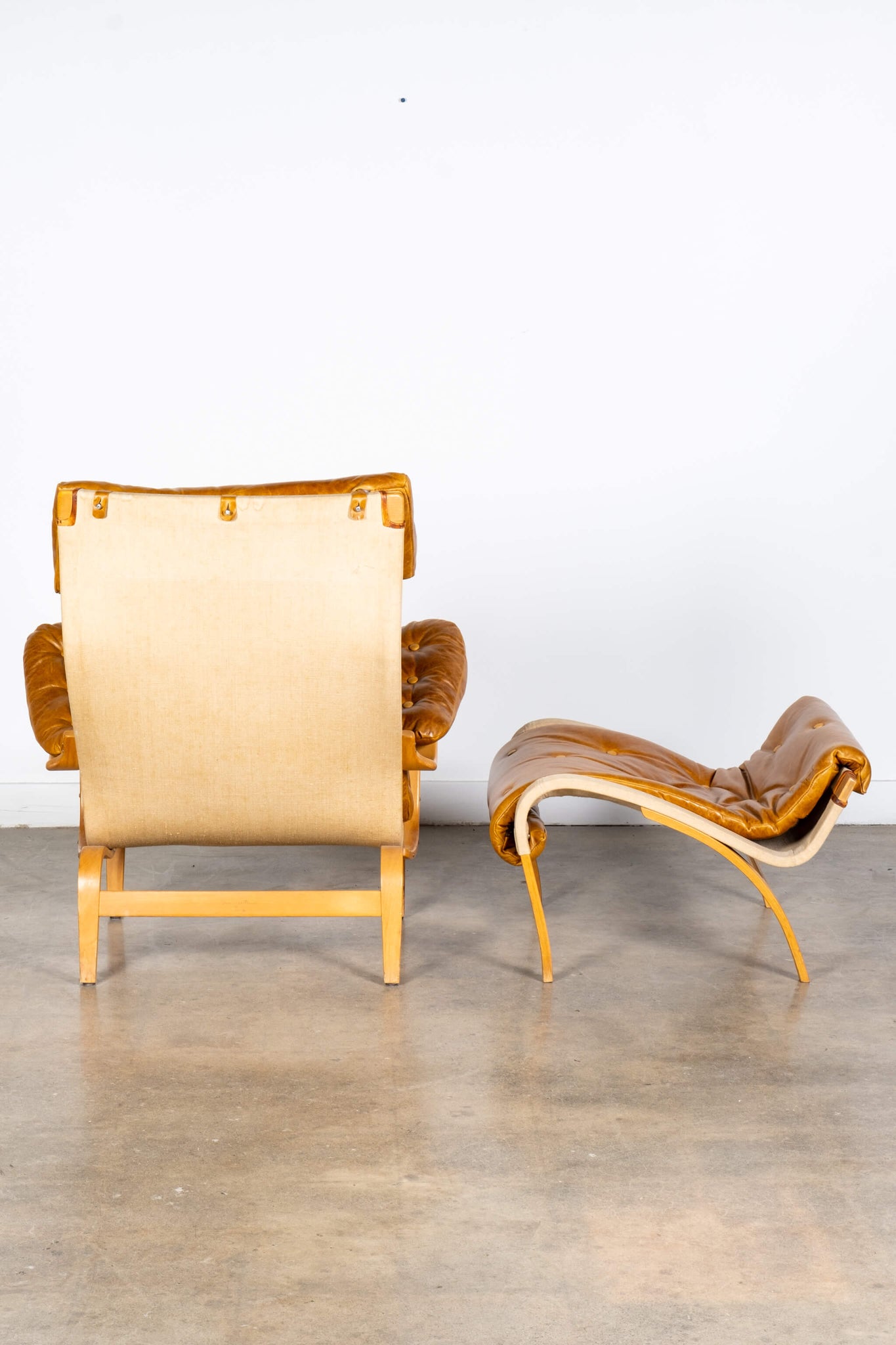 Pernilla 69 Leather and Beech Lounge Chair and Ottoman, back view