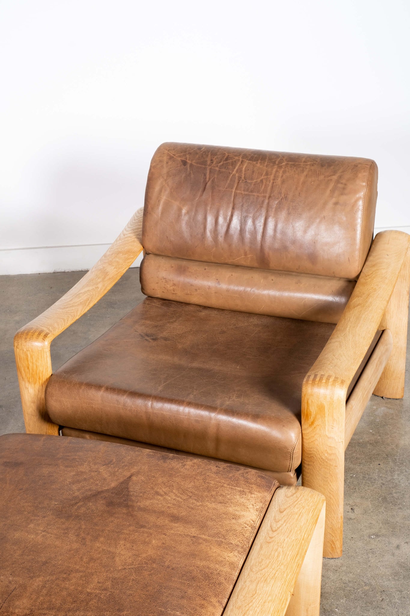 Wooden Frame and Leather Armchair and Ottoman