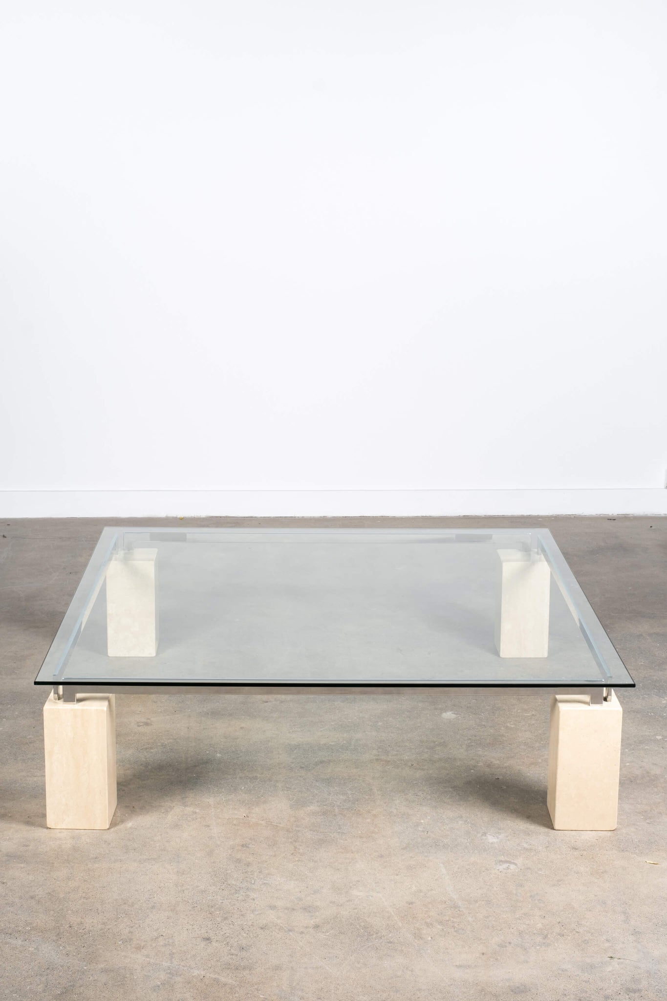 XL Glass Top Coffee Table with Travertine Legs & Chrome Frame Artedi, front view