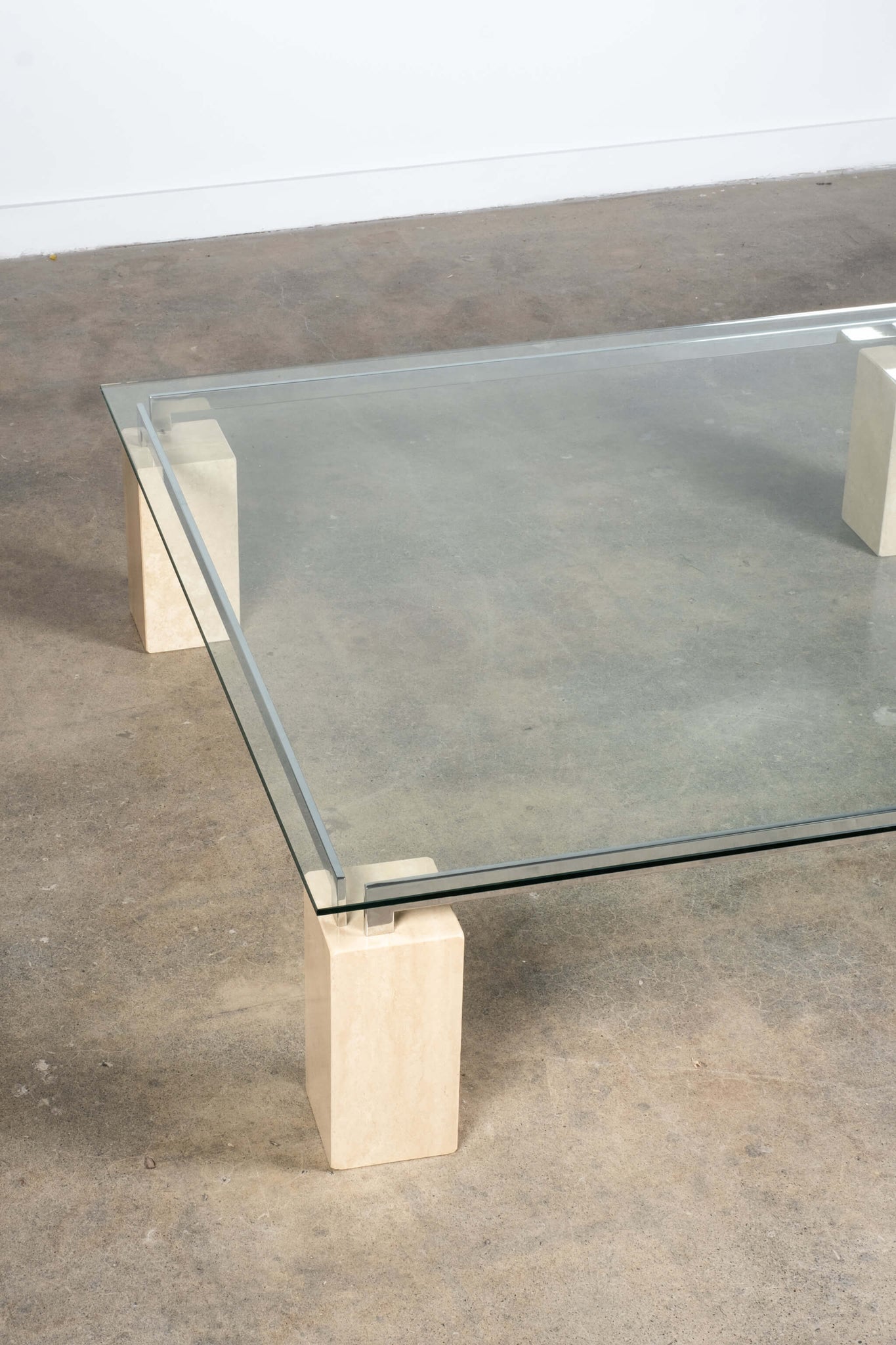 XL Glass Top Coffee Table with Travertine Legs & Chrome Frame Artedi, top view