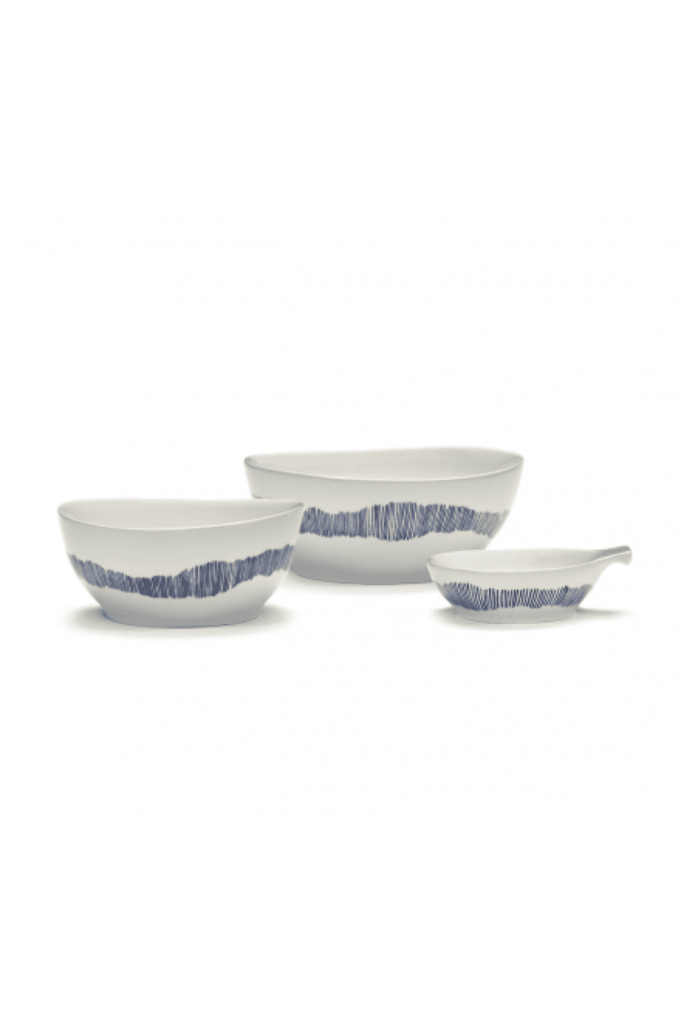 Small Bowl, White Swirl with Blue Stripes Ottolenghi Serax, shown with various bowls