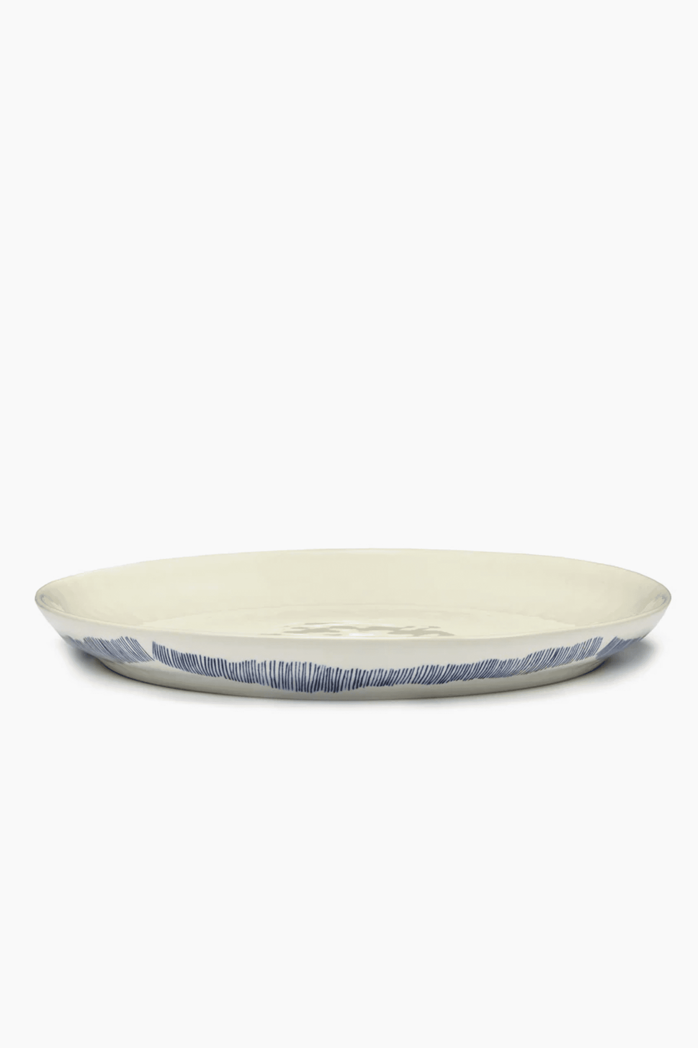 Small Serving Plate, White Swirl with Blue Stripes Ottolenghi Serax, side view